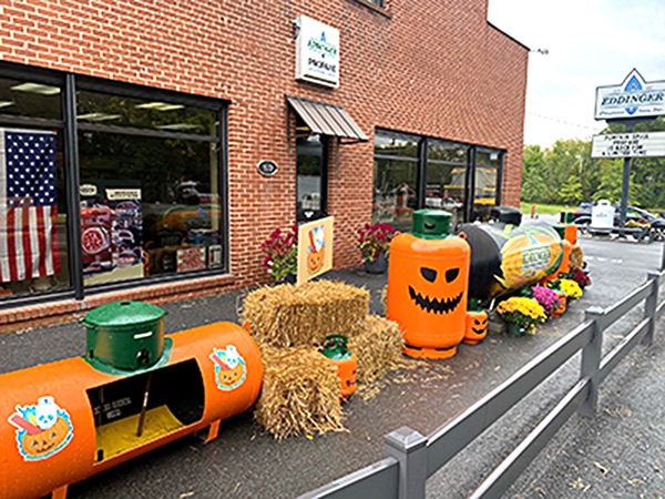 Eddinger Hardware & LP Gas leans into the pumpkin spice propane branding by decorating propane tanks for the Halloween season. 