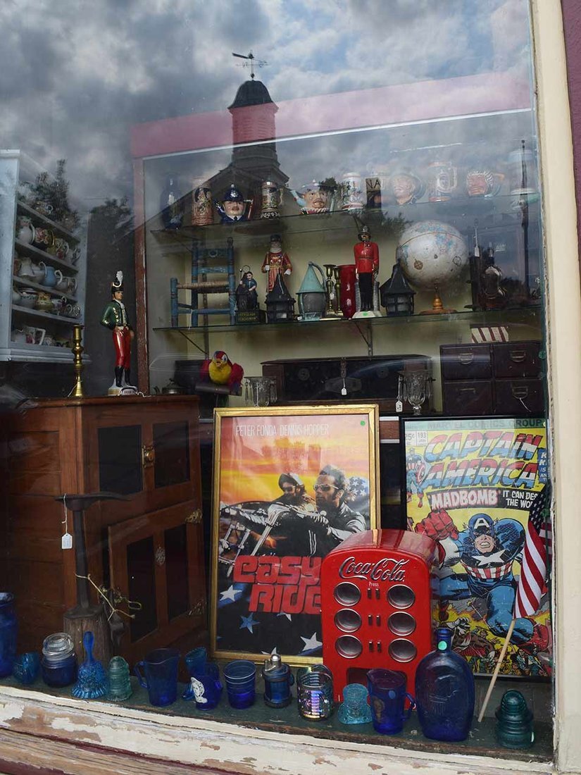 An eclectic mix of antiques and oddities can be found in the store’s window displays.