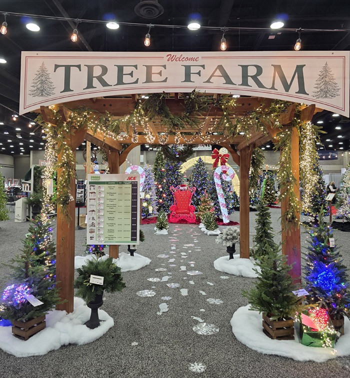 An artificial tree farm display reinforces a key merchandising takeaway: Fully decorated trees create a visual anchor that leads customers toward complete-package purchases, from ornaments to accessories. 