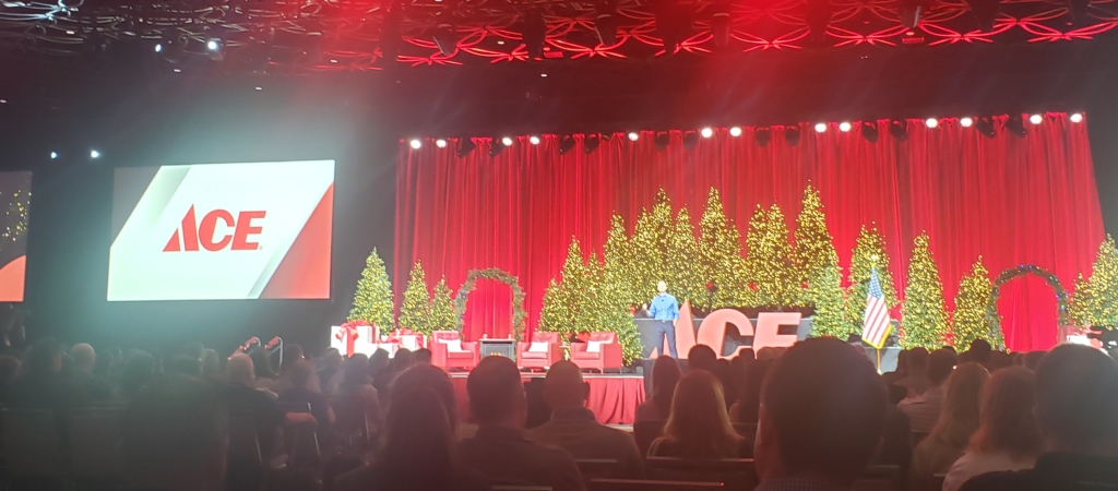 Ace CEO on stage Christmas in March at Ace Spring 2025 Convention in San Antonio