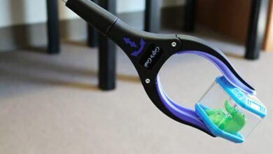 Ettore Gripn Grab in use Ettore 50-Inch Grip’n Grab Reach Tool