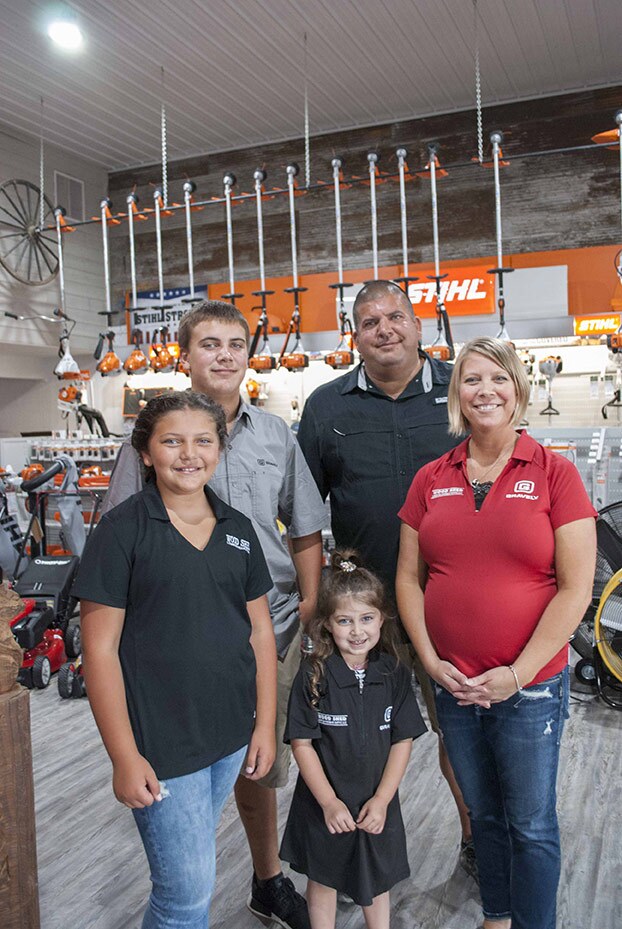 Cecil and Sharona Eiserer are developing Wood Shed Lumber & Hardware into a strong, sustainable business that can someday be passed on to their kids (from l to r): Cicily, Porter and Novah. 